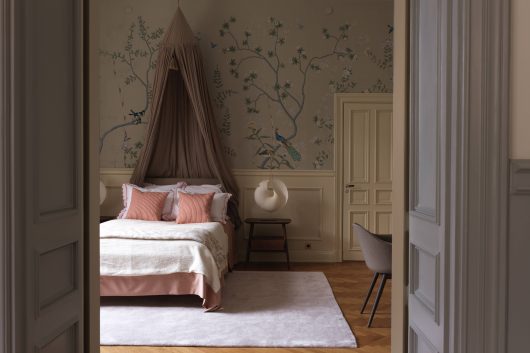 Sovrum i beige och gröna kulörer skapar ett varmt och mysigt intryck - Dekå Entreprenad hjälper dig med totalrenoveringen av din lägenhet eller hus i Stockholm